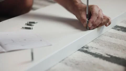 Low Angle View Screwing Bolt into Wooden Shelf 스톡 동영상 344145836