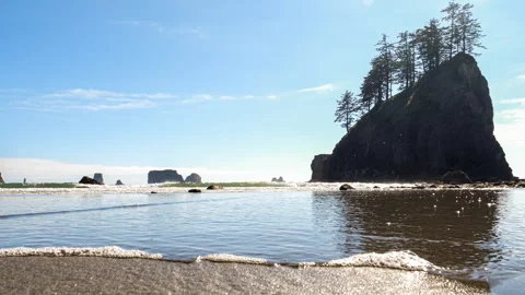 Low angle view of sea stacks in La Push, Washington with gentle waves Stock Footage 280825224