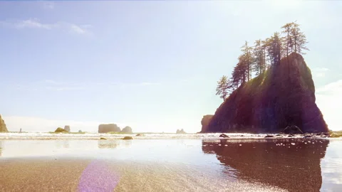 Low angle view of sea stacks in La Push, Washington with gentle waves Stock Footage 281529019