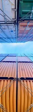 Low Angle View of Shipping Containers Against Blue Sky on Container Ship Stock Photos
