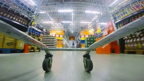 Low angle view of shopping cart rush in supermarket Stock Footage 72787835