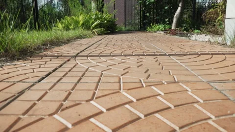 Low angle view showing textured brick circle pattern. Earthtoned terracotta Stock Footage 335766881