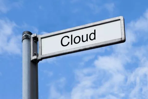 Low angle view of signpost with cloud sign against sky Foto stock