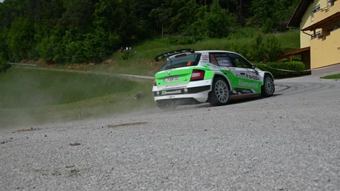 Low angle view of Škoda Fabia R5 car drives at high speed Stock Footage 255271375