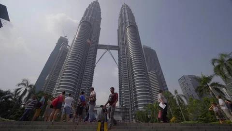 Low angle view of skyline with tourist in the city of kuala lumpur Video stock 111279550