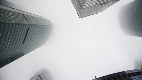 Low angle view of skyscrapers and fog Stock Footage 290877343
