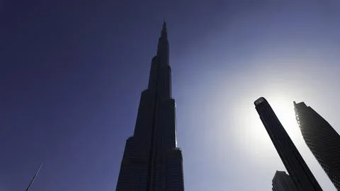 A low angle view of the skyscrapers in the centre of Dubai. Action. Concept of Stock Photos