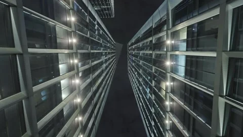 Low angle view of skyscrapers in city at night Video stock 240169689