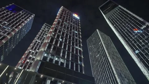 Low angle view of skyscrapers in city at night Video stock 240170314