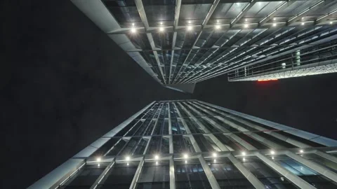 Low angle view of skyscrapers in city at night Video stock 240175357