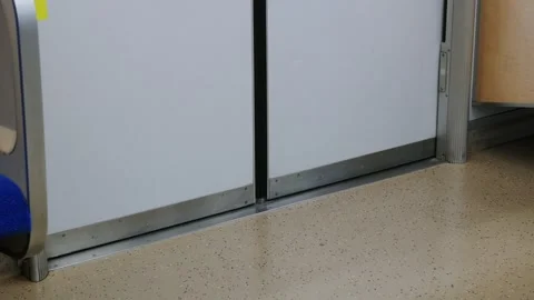 Low angle view to skytrain subway door from inside the train commuter while.. Stock Footage 335580382