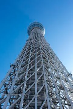 Low angle view of the SkyTree with a blue sky in the background, tokyo Stock Photos
