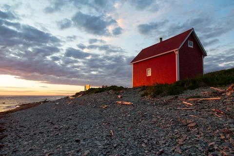 Low angle view of small red cabin on the remote Île aux Perroquets Stock Photos