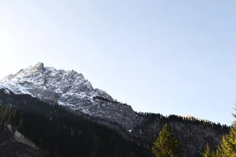 Low angle view of snowcapped mountain against clear sky in Jiuzhaigou Stock Photos