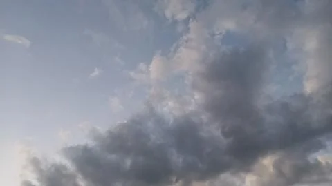 Low angle view of soft white cumulus clouds Stock Photos