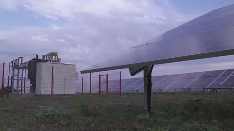 Low angle view of the solar panels at a power station and a transformer Stock Footage 160114572