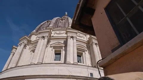 Low Angle View of St. Peter's Basilica Dome Against Deep Blue Sky in Vatica.. Видео 339861168