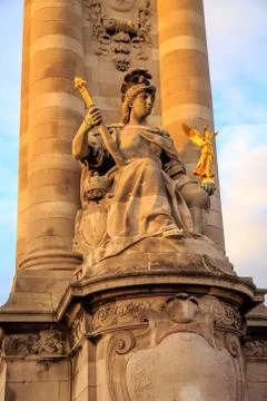 Low angle view of a statue on a column in Paris, France on a sunny day Photos