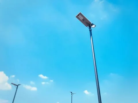 Low Angle View of Street Lighting Post Against Blue Sky Stock Photos