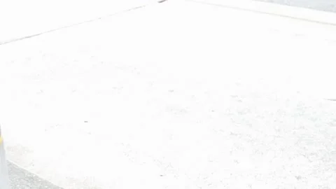 Low angle view to the street road at bus stop with view of buses leaving an.. Stock Footage 243995137