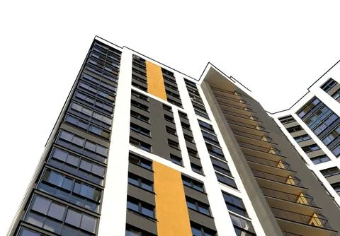 Low angle view of a tall condominium building with modern architecture, white Stock Photos