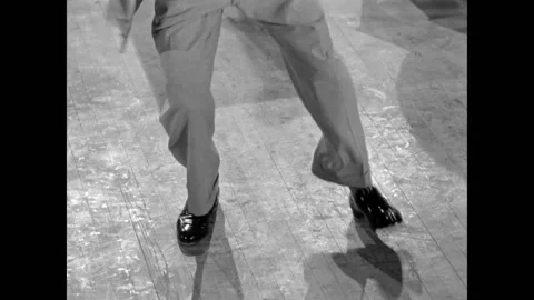 Low angle view of tap dancer performing, 1950s Stock Footage 260257434