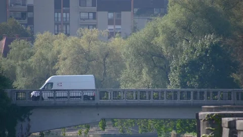 Low angle view, telephoto perspective of vehicles driving on concrete bridge Stock Footage 162256973