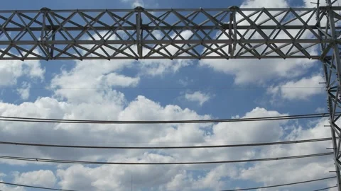 Low angle view through steel tower lattice against the sky Stockbeeldmateriaal 278367598