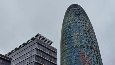 Low angle view of Torre Agbar in Barcelona 스톡 동영상 334166267