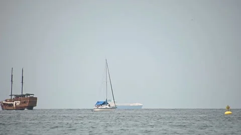 Low angle view of tourist pirate boat sailing in open sea Stock Footage 160589825