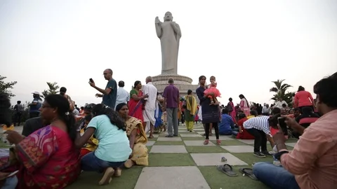 Low angle view of tourists at buddha statue Stock Footage 105980393