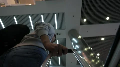 Low angle view of tourists pulling a suitcase in the airport Stockbeeldmateriaal 62615191