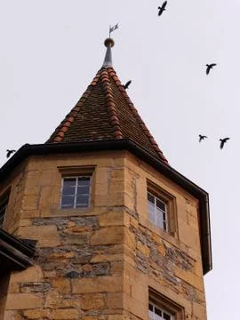Low angle view of the tower of the Murten Castle at dusk in Switzerland. Foto stock