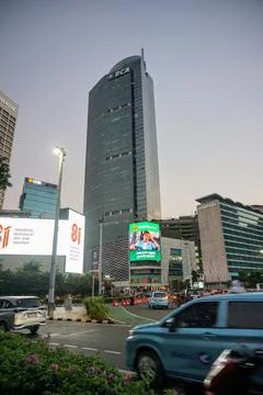 Low angle view of the towering Menara BCA skyscraper in the central business Stock-Fotos