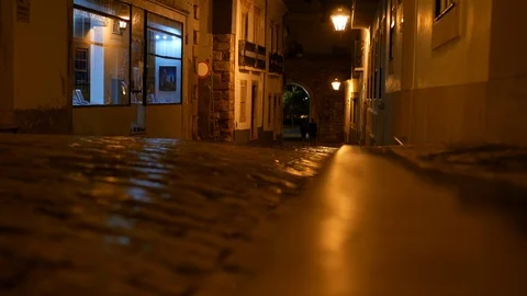 Low angle view, traditional street at night in Faro, Algarve, Portugal Stock Footage 104520488