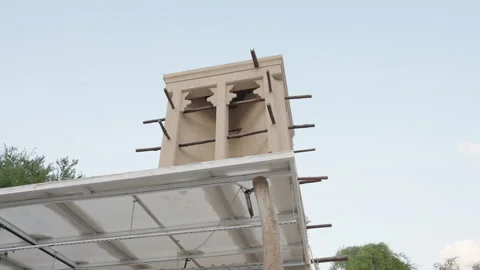 Low Angle View of Traditional Wind Towers and Heritage Architecture Stock Footage 322987038