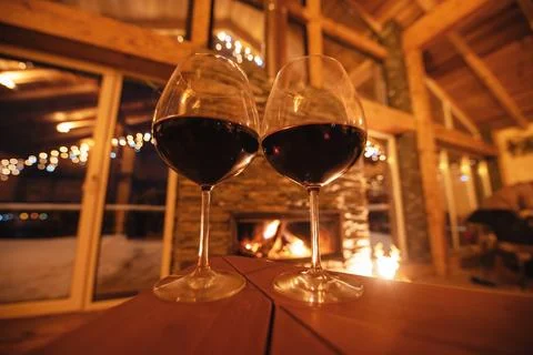 Low angle view of the two glasses of red wine on cafe restaurant table Stock Photos