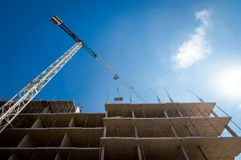 Low angle view on unfinished edifice, building under construction and tower.. Fotos de archivo