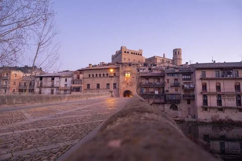 Low angle view of Valderrobres Medieval bridge over Matarranya river with Santa Stock Photos