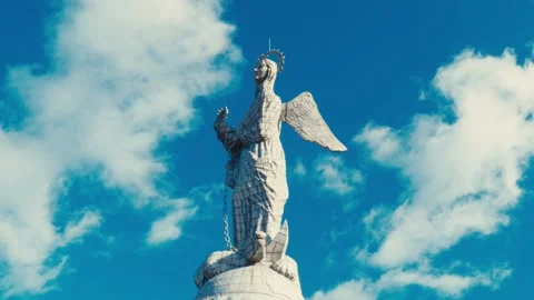 Low-angle view of the Virgin of El Panecillo statue in the city of Quito 動画素材 345092276
