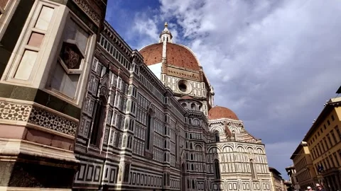 Low angle view walking toward the Florence Duomo, Cathedral of Santa Maria del Stock Footage 346152262