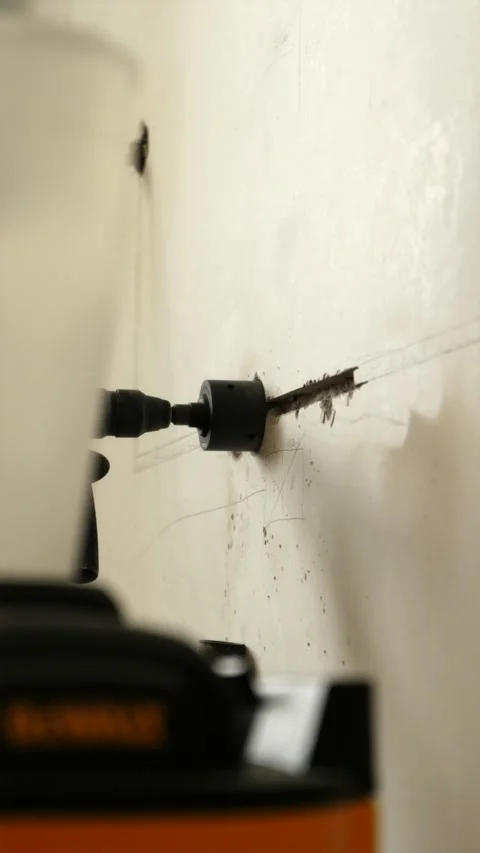 Low angle view of wall channeling with vacuum nozzle vertical Stock Footage 339298266