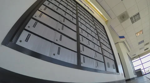 Low Angle View Of Wall Of Post Office Lock Boxes Vidéo 65237000