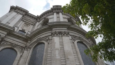 A low angle view of the walls and windows of a cathedral. Stock Footage 107952858