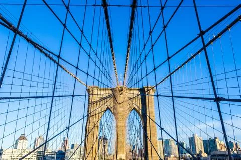 Low angle view of the web of cables of Brooklyn bridge, New York, USA Stock Photos