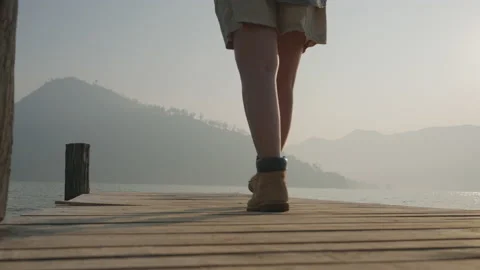 Low angle view wellbeing female solo trip calm countryside wanderlust. 스톡 동영상 210955865