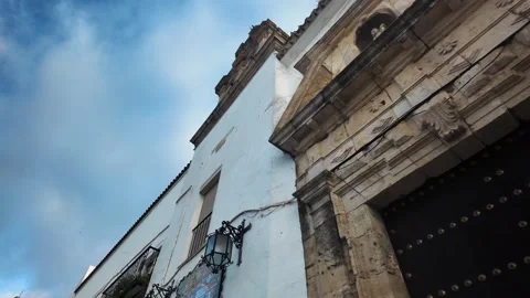 Low angle view of white building and tile mural, Arcos de la Frontera, Spain Stock Footage 346280502