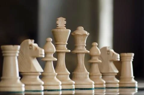 Low angle view of white chess pieces Stock Photos