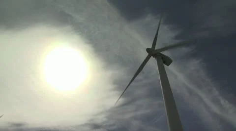 Low Angle View of Wind Turbine With the Sun In the Background 動画素材 19169394