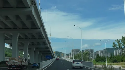 Low angle view of Yantai's city interchange, with intersecting roads Stock Footage 282068858
